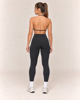 By Shybani Contour Halter Set in Black — rear outfit