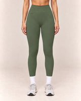 By Shybani Contour High-Waist Leggings in Olive Green — front studio product view
