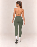 By Shybani Contour High-Waist Leggings in Olive Green — rear step