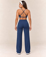Cross-Back Flare Set in Navy — rear standing