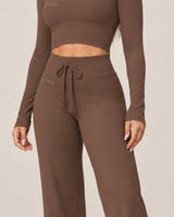 By Shybani Flow Square-Neck Long-Sleeve Top in Brown — sleeve and curved hem detail