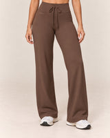 By Shybani Flow Wide-Leg Trousers in Brown — front studio product view