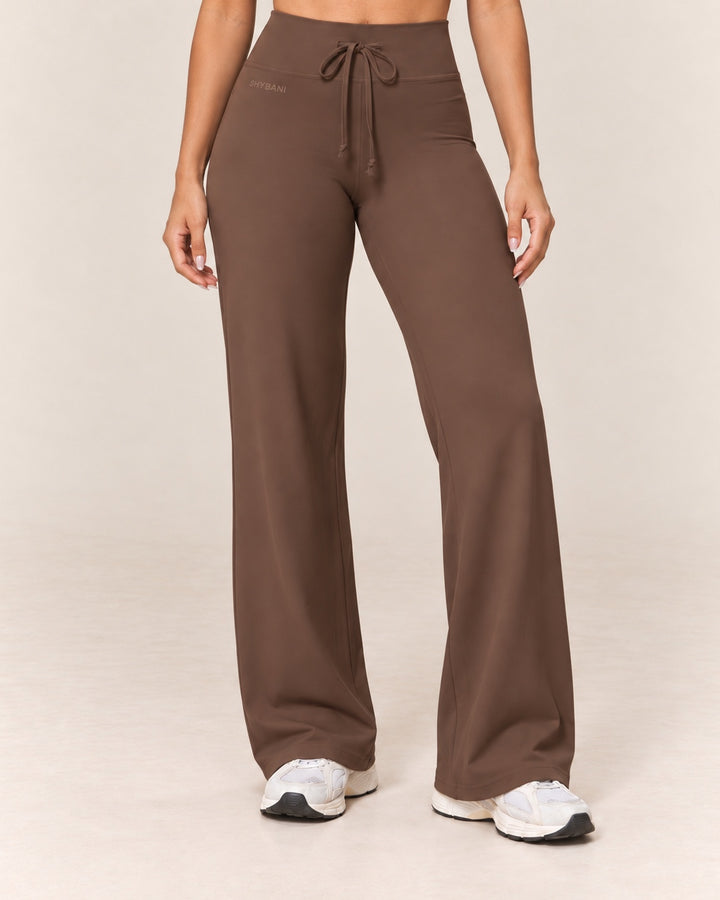 By Shybani Flow Wide-Leg Trousers in Brown — front studio product view