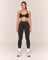 By Shybani Halter Sports Bra in Black — full outfit