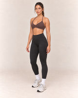 By Shybani Halter Sports Bra in Coffee — front three-quarter
