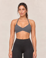 By Shybani Halter Sports Bra in Dark Grey — front