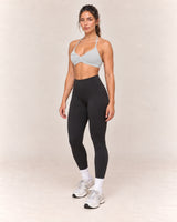 By Shybani Halter Sports Bra in Grey — front three-quarter