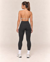 By Shybani Halter Sports Bra in Grey — back