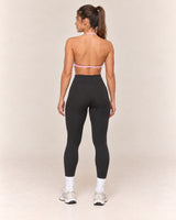 By Shybani Halter Sports Bra in Pink — back