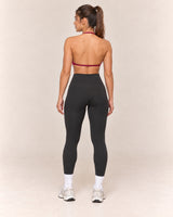 By Shybani Halter Sports Bra in Wine Red — back