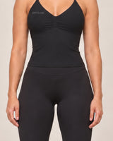 By Shybani Halter Tank Top in Black — hem and fabric detail