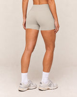 Shybani High-Waist Studio Shorts in Camel — back