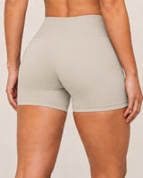 Shybani High-Waist Studio Shorts in Camel — back detail