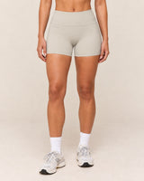 Shybani High-Waist Studio Shorts in Camel — front