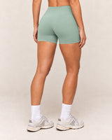 Shybani High-Waist Studio Shorts in Green — back