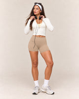 Shybani High-Waist Studio Shorts in Khaki — full outfit