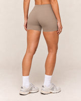 Shybani High-Waist Studio Shorts in Light Brown — back