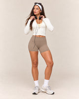 Shybani High-Waist Studio Shorts in Light Brown — full outfit