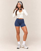 Shybani High-Waist Studio Shorts in Navy — full outfit