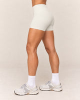 Shybani High-Waist Studio Shorts in White — side