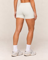 Shybani High-Waist Studio Shorts in White — back