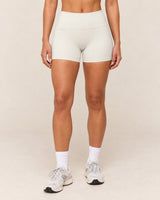 Shybani High-Waist Studio Shorts in White — front