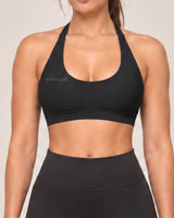 By Shybani Scoop-Neck Halter Bra in Black — neckline detail