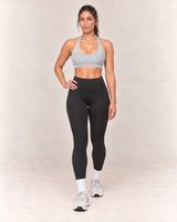 By Shybani Scoop-Neck Halter Bra in Grey — front step