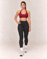 By Shybani Scoop-Neck Halter Bra in Wine Red — front step