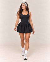 Scoop-Neck Mini Dress in Black — front step